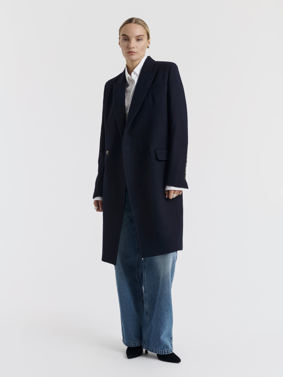 Navy CARA double-breasted long coat worn, front view