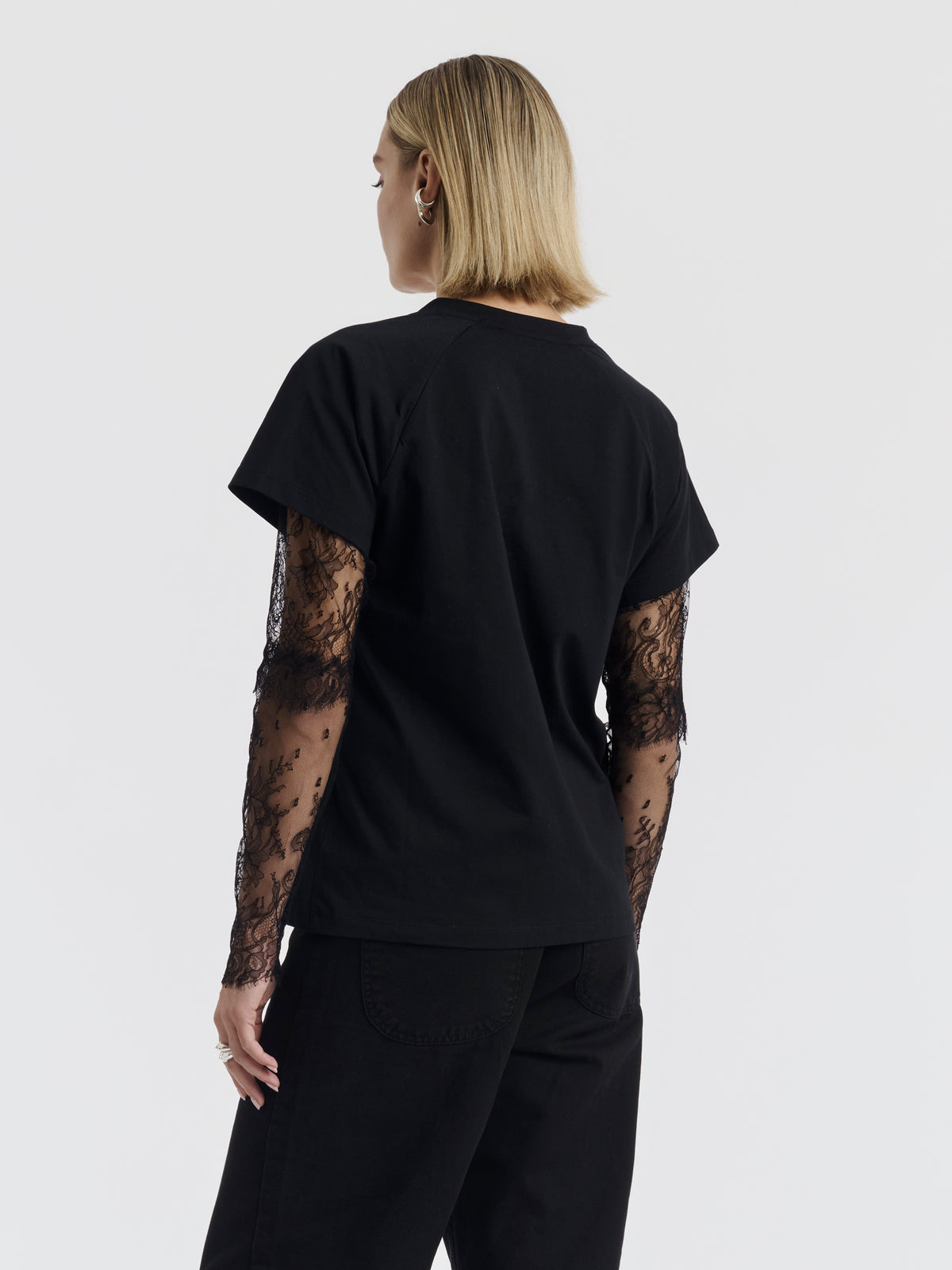 Black COURTNEY T-shirt with lace sleeves worn, front view
