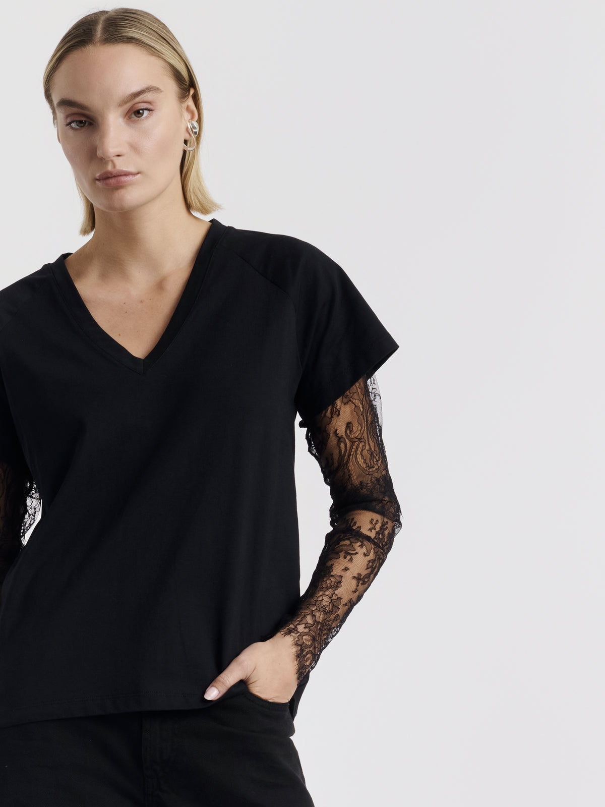 Black COURTNEY T-shirt with lace sleeves worn, front view