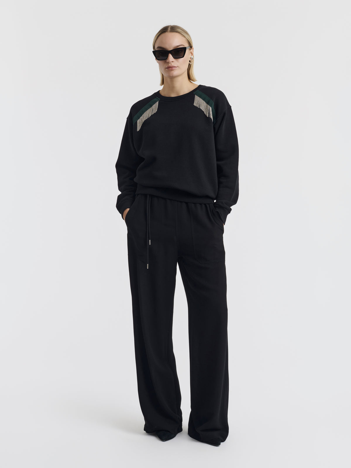 Black VIC CREPE wool wide-leg trousers worn