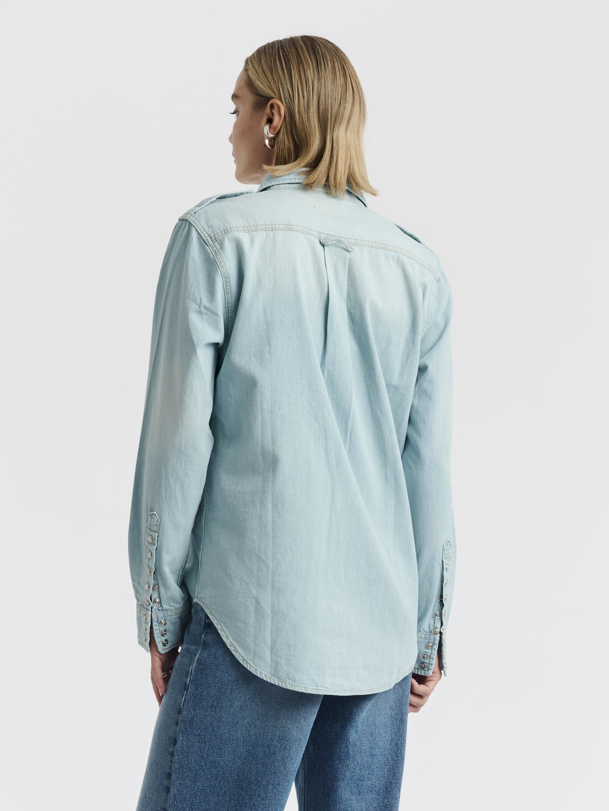 Light blue denim TITI shirt worn, back view