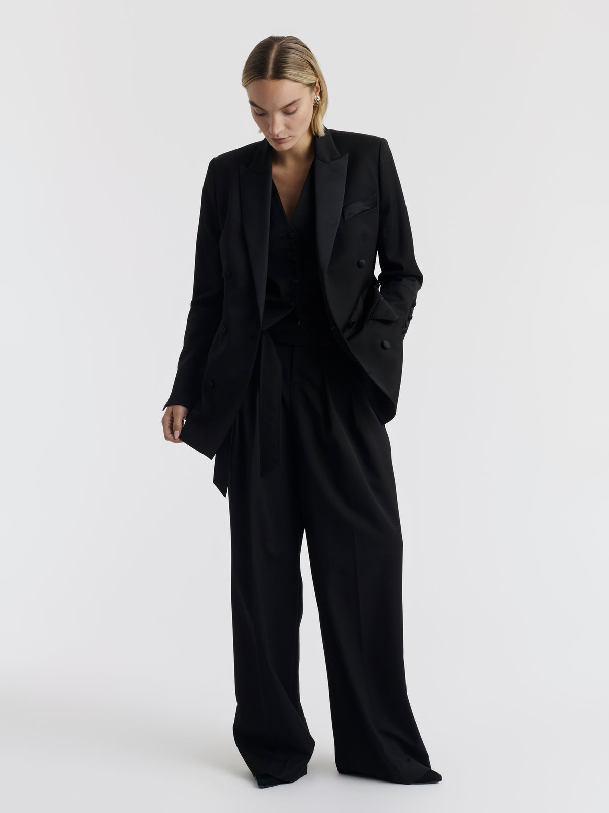 Black WOODY wide-leg trousers worn, front view