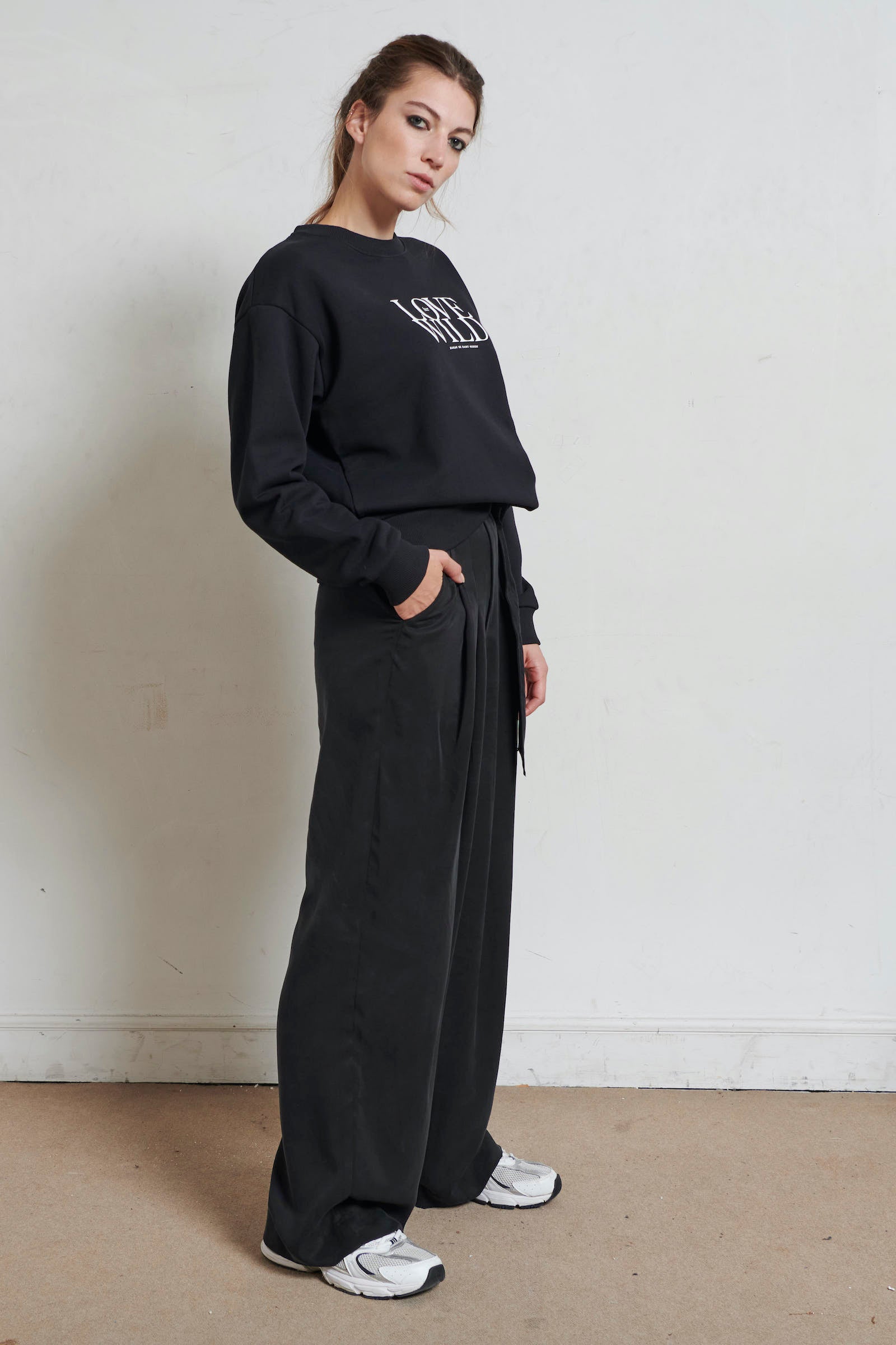 SARAH DE SAINT HUBERT relaxed fit sweatshirt, featuring our signature 'Love her Wild' print. Made from a 100% cotton fleece, colour black. Made in Portugal