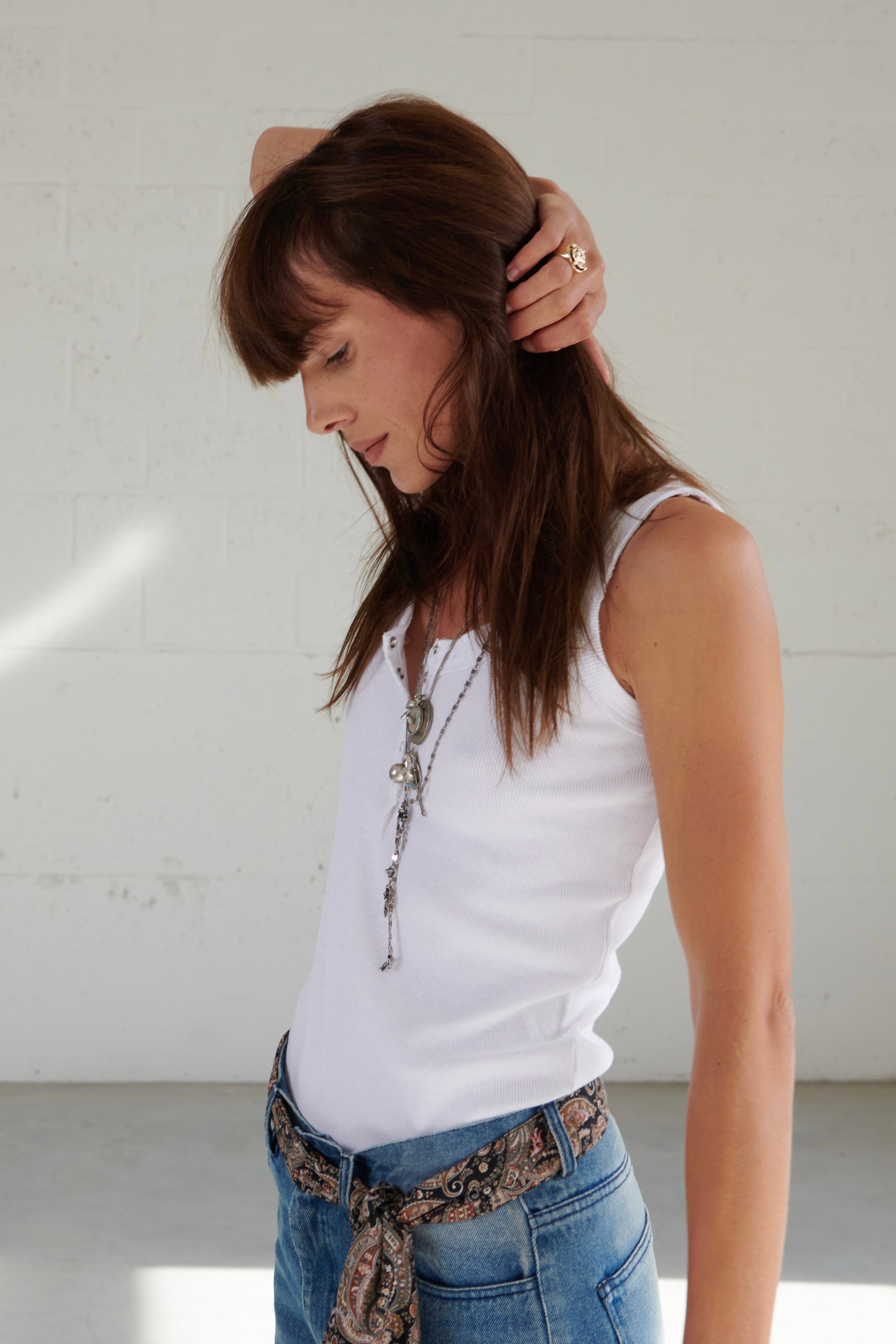 Iconic white tank top for women's in rib with polo rib border details, straight fit, press buttons placket at frontside, 100% cotton jersey. Made in Turkey