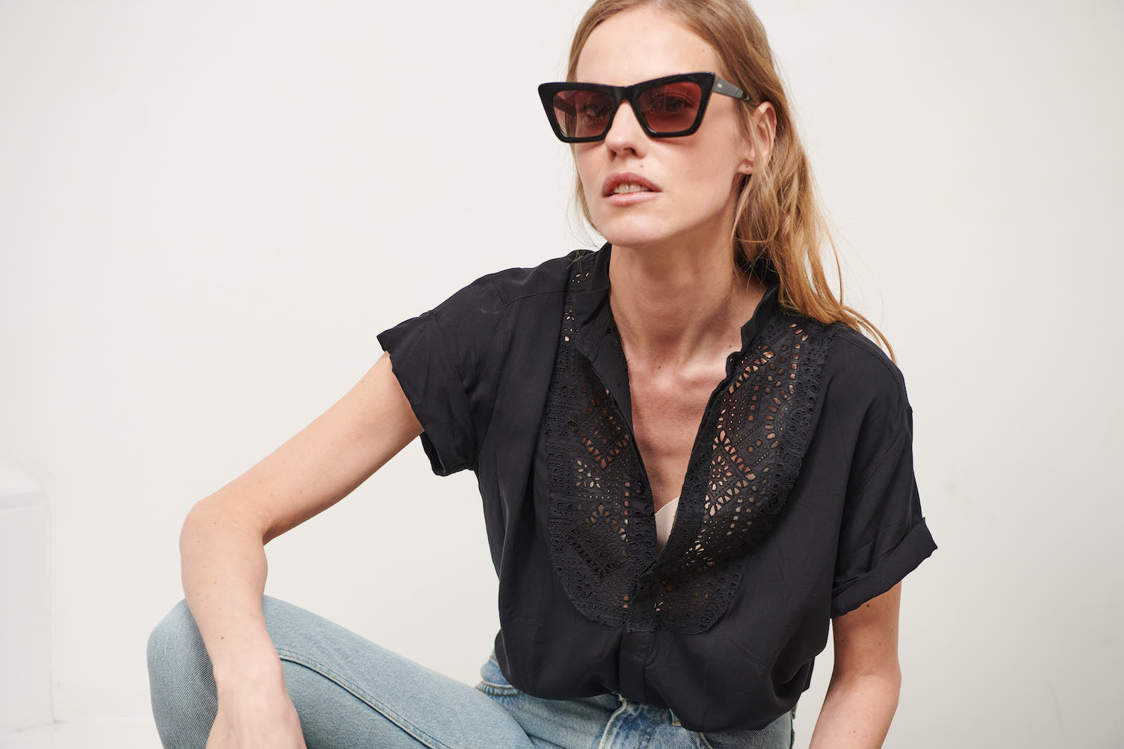 Fluid women's black smoking shirt with broderie anglaise, application smoking cuffs with self covered buttons Black viscose with black cotton broderie anglaise. Made in Portugal