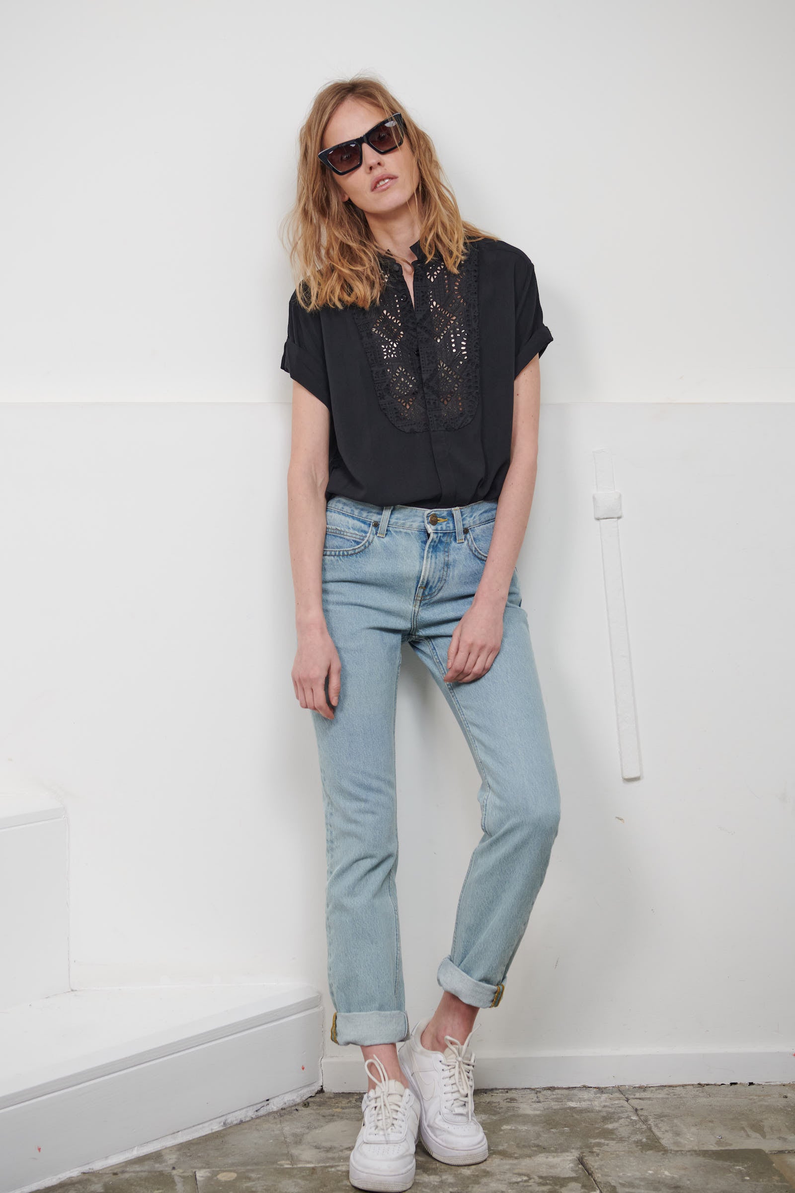 Fluid women's black smoking shirt with broderie anglaise, application smoking cuffs with self covered buttons Black viscose with black cotton broderie anglaise. Made in Portugal