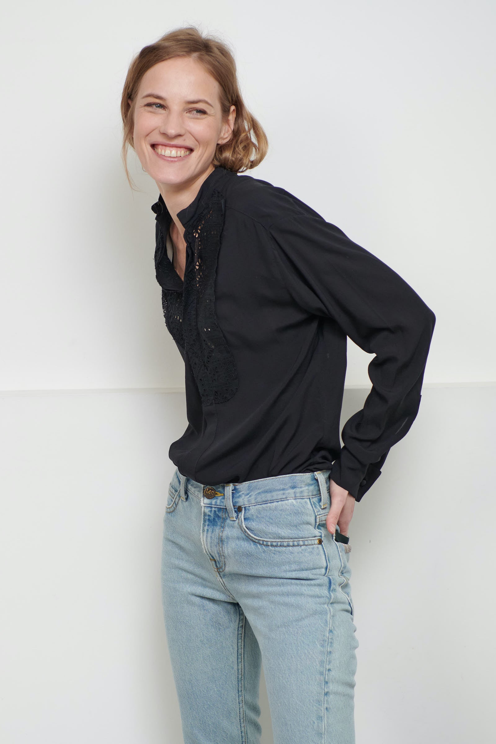 Fluid women's black smoking shirt with broderie anglaise, application smoking cuffs with self covered buttons Black viscose with black cotton broderie anglaise. Made in Portugal