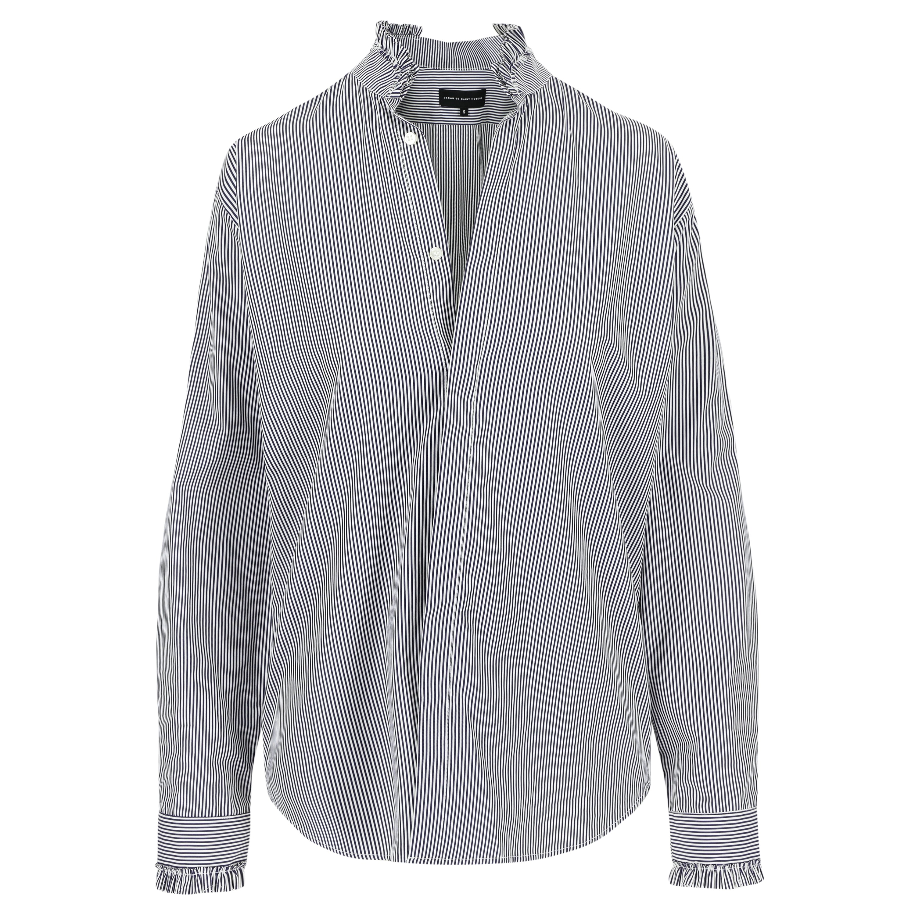 SARAH DE SAINT HUBERT navy stripes smoking shirt made of viscose with ruffle applications. A timeless feminine shirt with a straight/relaxed fit.