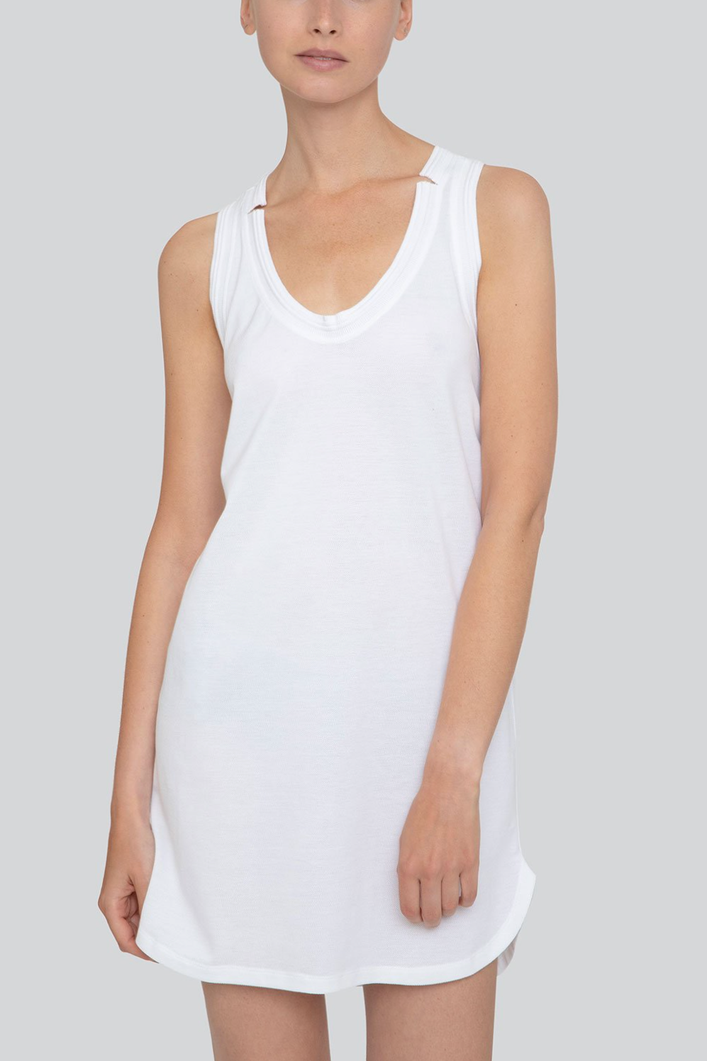 SARAH DE SAINT HUBERT white raceback tunique made of cotton piqué jersey with iconic raw-cut rib borders details. Oversized and straight fit.