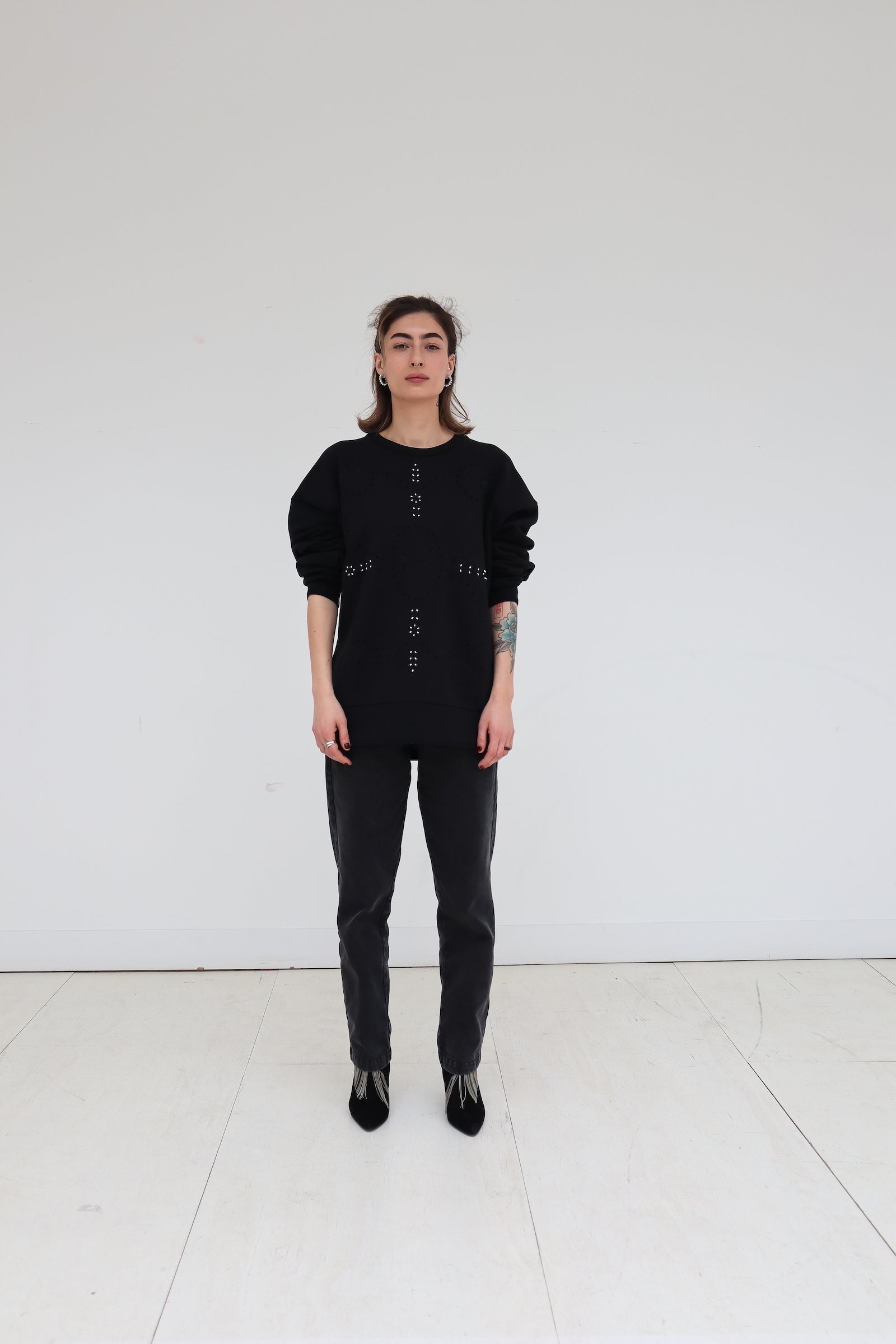 Signature Sweatshirt featuring our iconic 'broderie anglaise' at the front. Hand-Embroidered in BELGIUM with small pearls at the front (perles de cultures, 'grains de riz'). Relaxed fit, dropped shoulders. 100% black cotton. Made in Portugal, embroidered in Belgium other sizes available on demand
