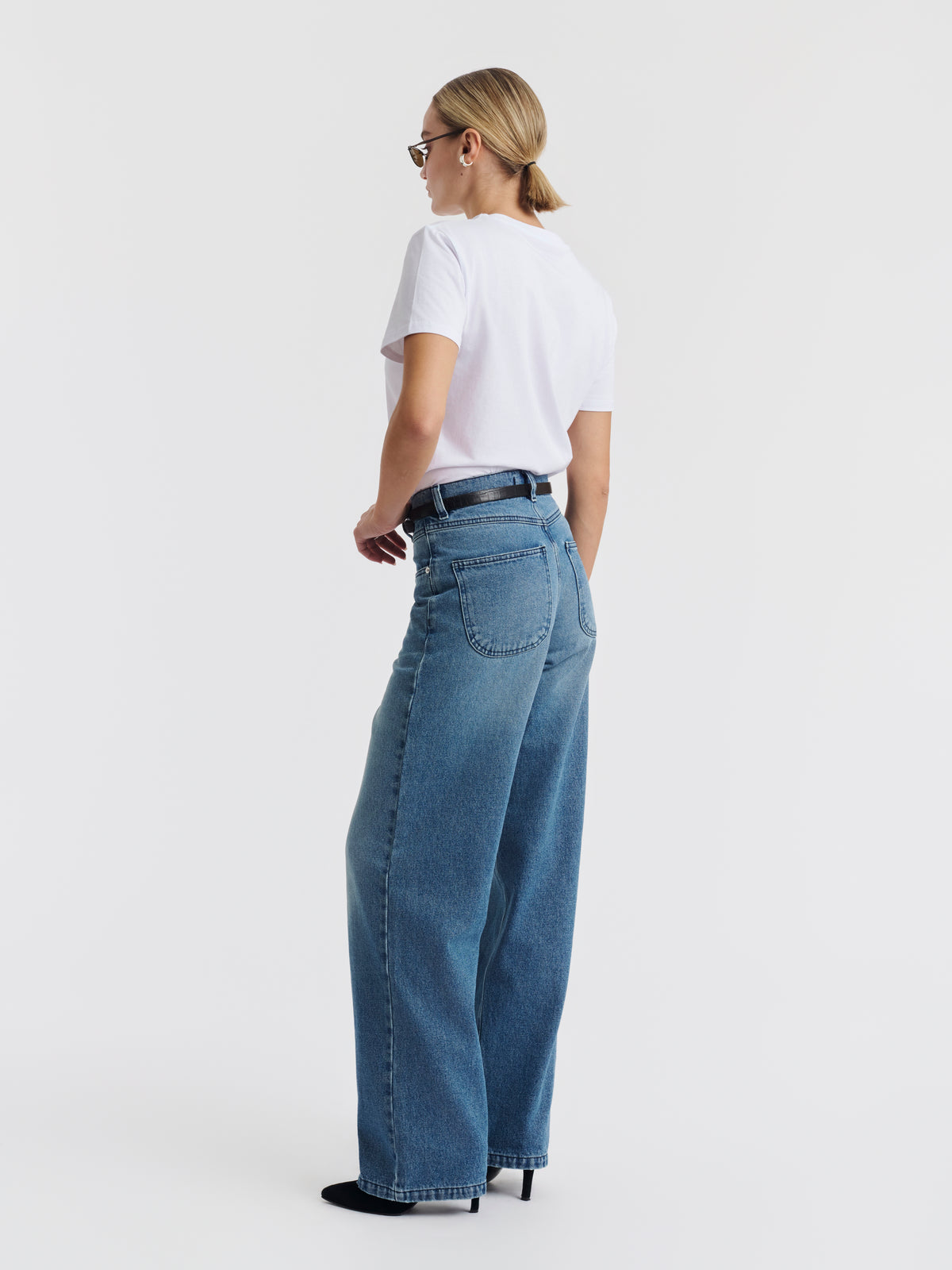 Washed blue JENNI jeans worn with the white DEVA T-shirt
