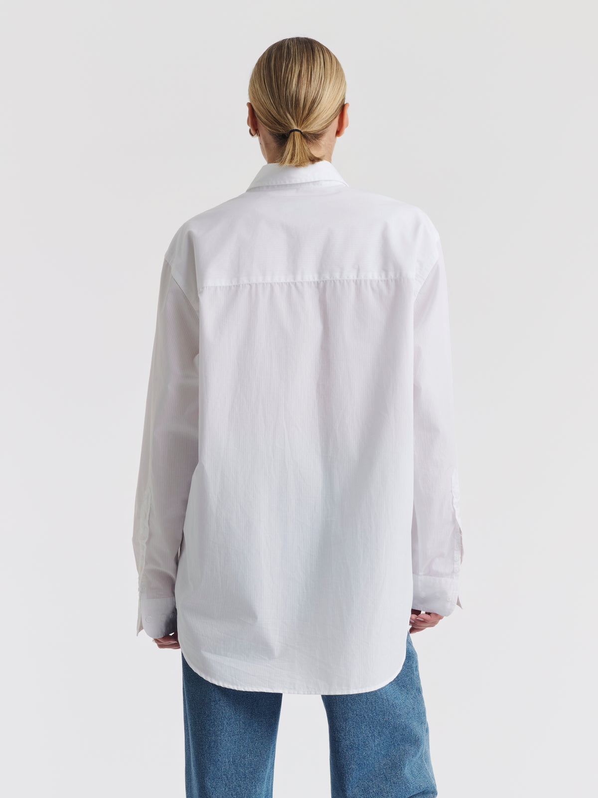 White MEL oversized shirt worn with blue JENNI jeans