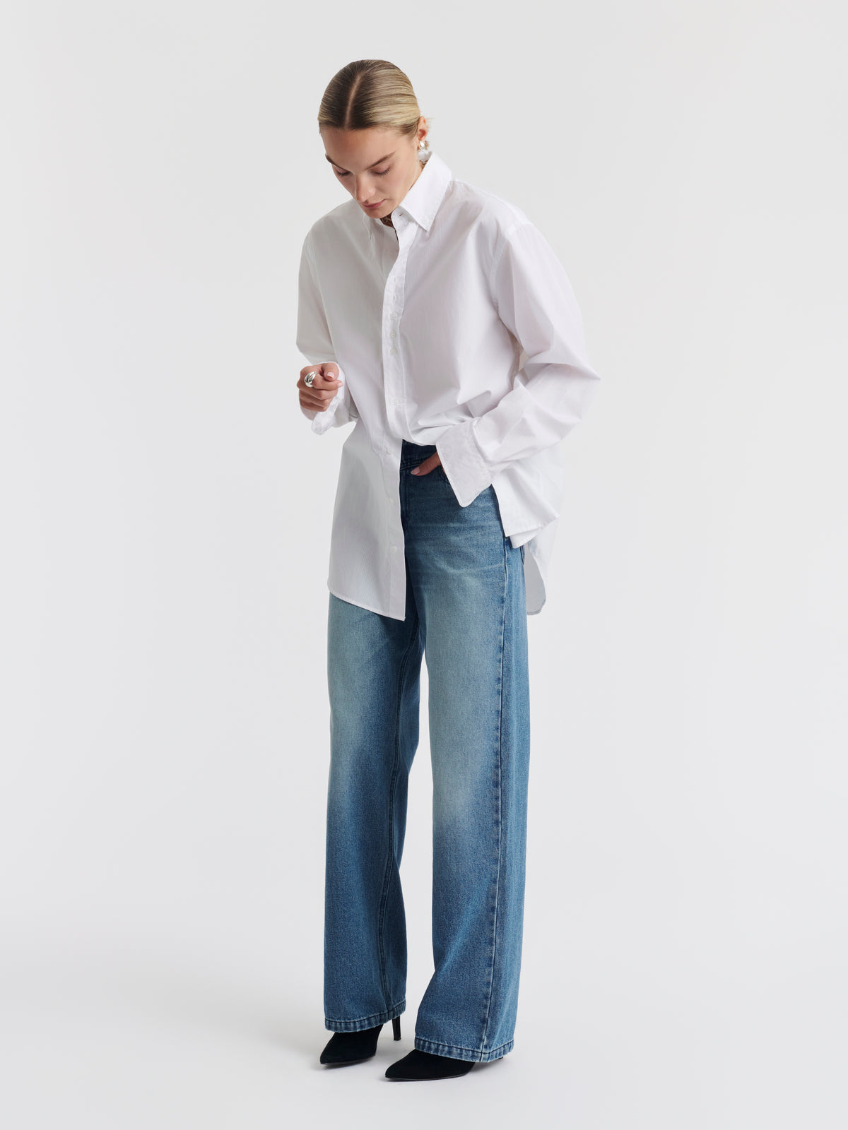 White MEL oversized shirt worn with blue JENNI jeans