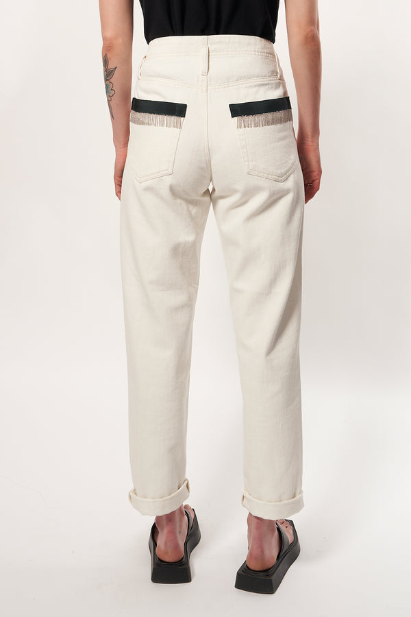 An expertly crafted denim trouser, combining a relaxed, tapered fit, mid-rise and a slightly dropped crotch. Crafted from 100% cotton, with two pleats at the front side and four pockets, these trousers feature signature hand-embroidered chains and dark green gros-grain tape on the backside pockets. A metal zipper closure on the front completes the design. Kara is 168 cm tall and wears a size XS. Made in Portugal.