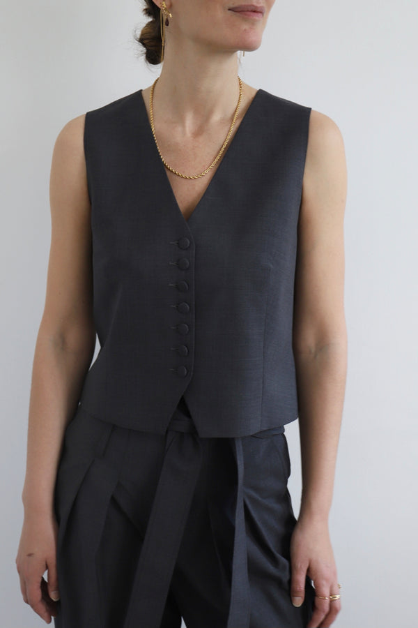 SARAH DE SAINT HUBERT elegant and gently fitted waistcoat with self covered buttons.  Made in a mid-grey Italian virgin wool, matching our Billie tailored jacket and Woody tailored trousers, made in Portugal