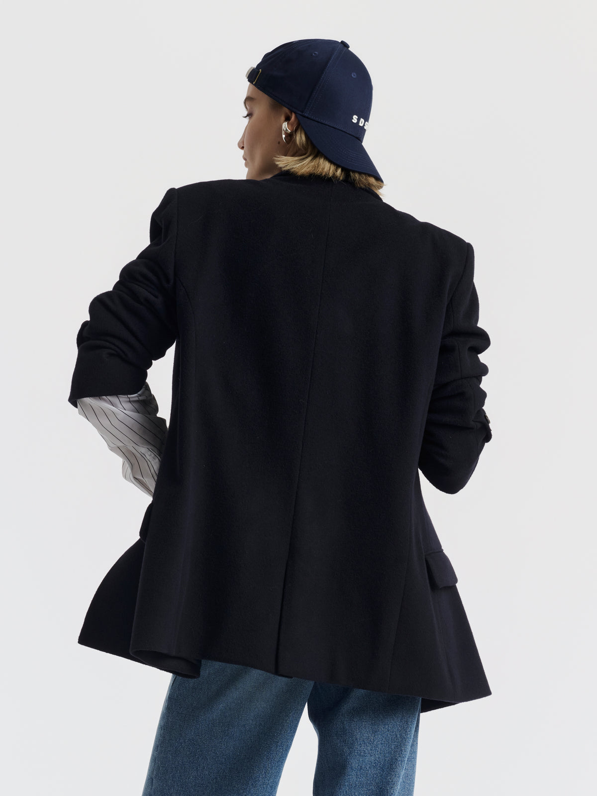 Navy BILLIE recycled wool jacket worn over the FANNY shirt and JENNI jeans