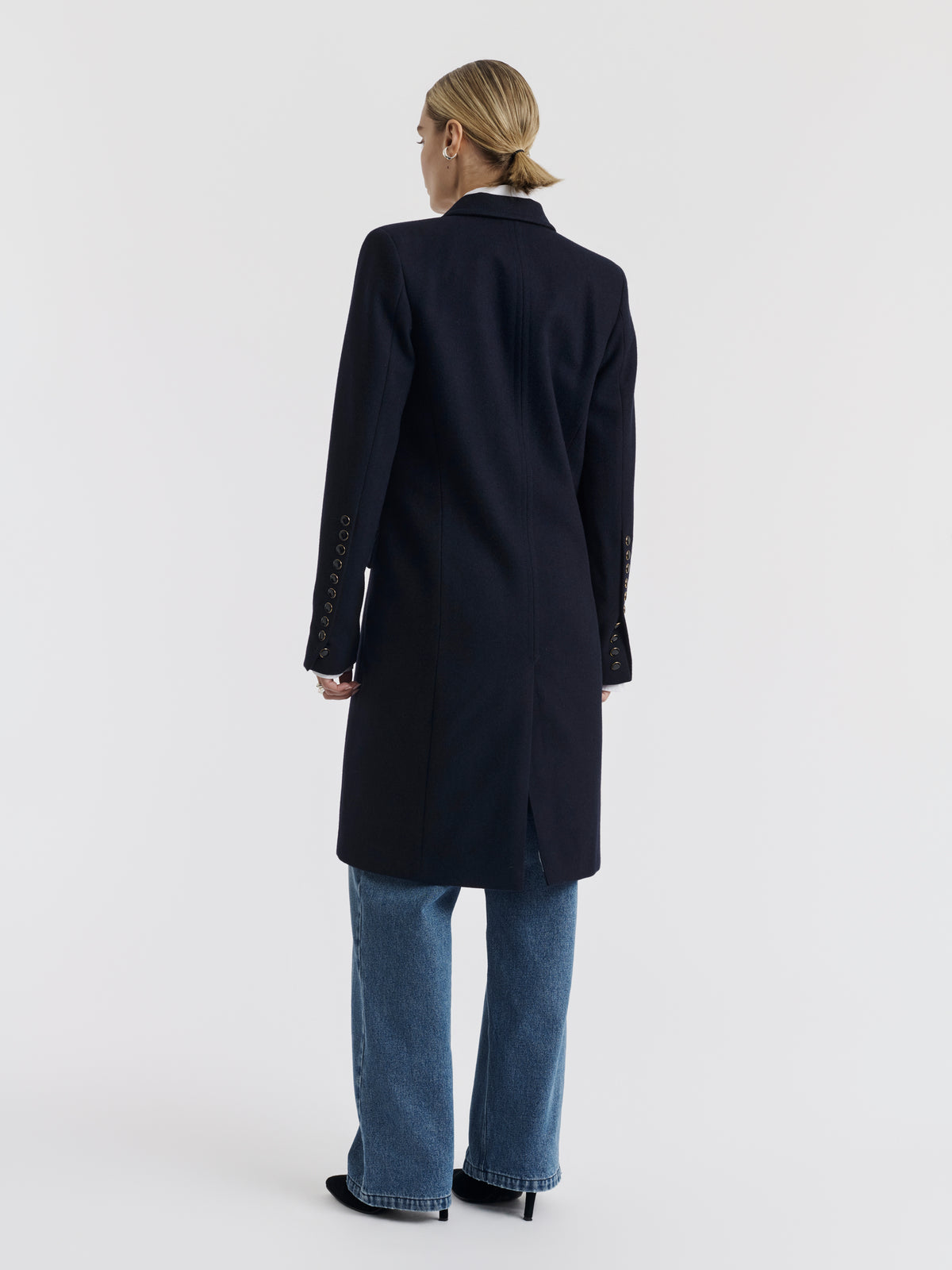 Navy CARA double-breasted long coat worn, front view