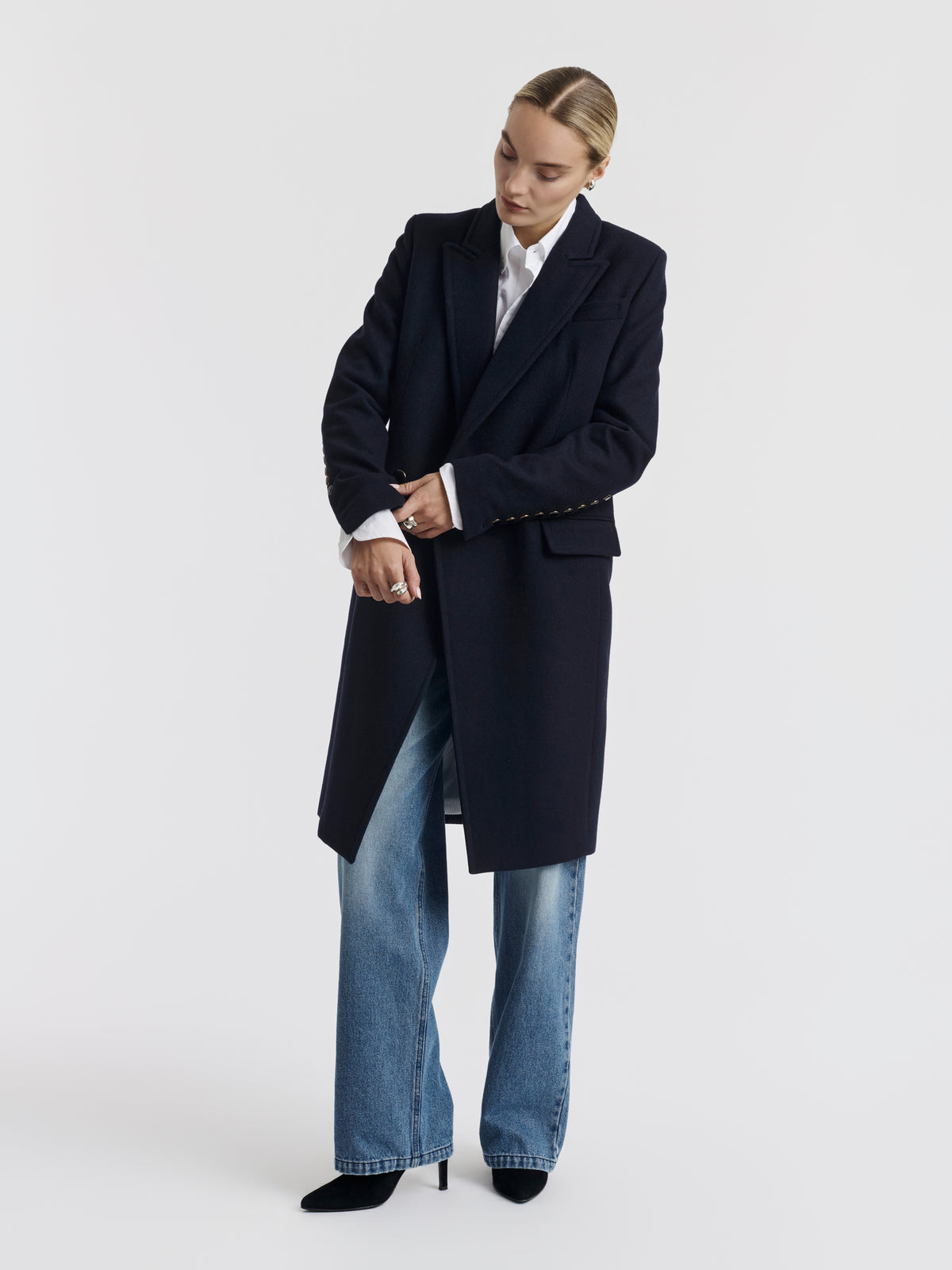 Navy CARA double-breasted long coat worn, front view