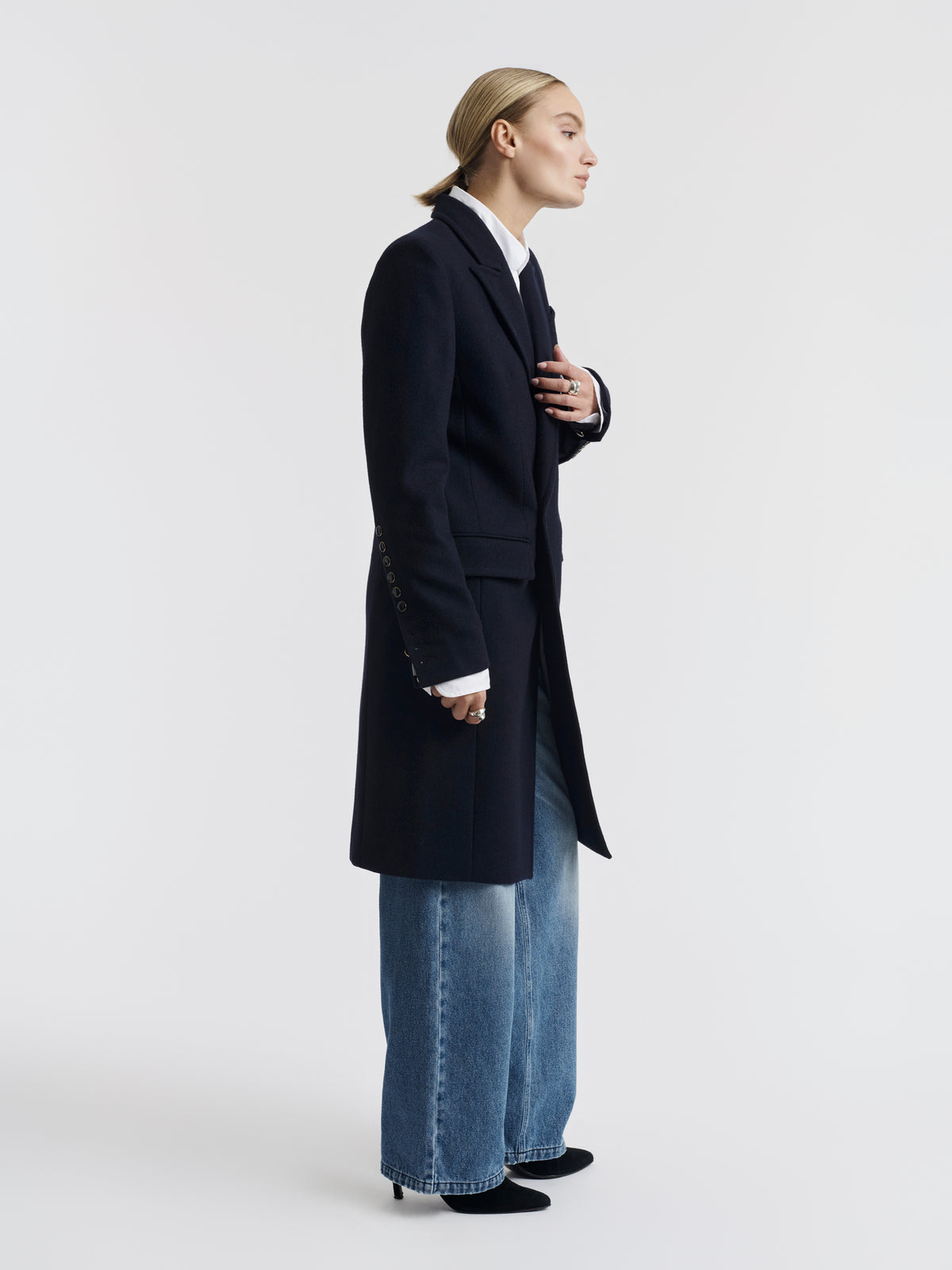 Navy CARA double-breasted long coat worn, front view
