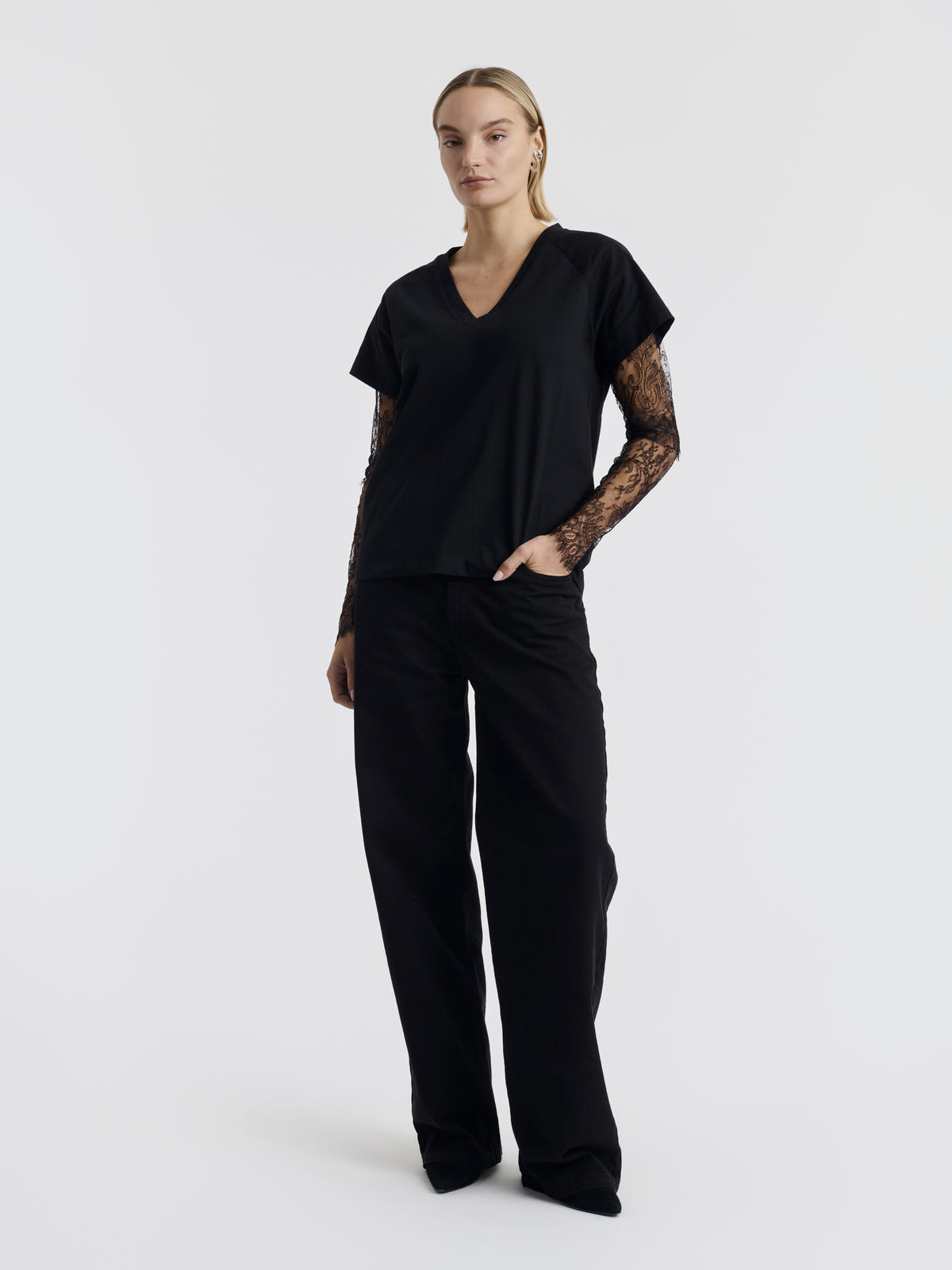 Black COURTNEY T-shirt with lace sleeves worn, front view