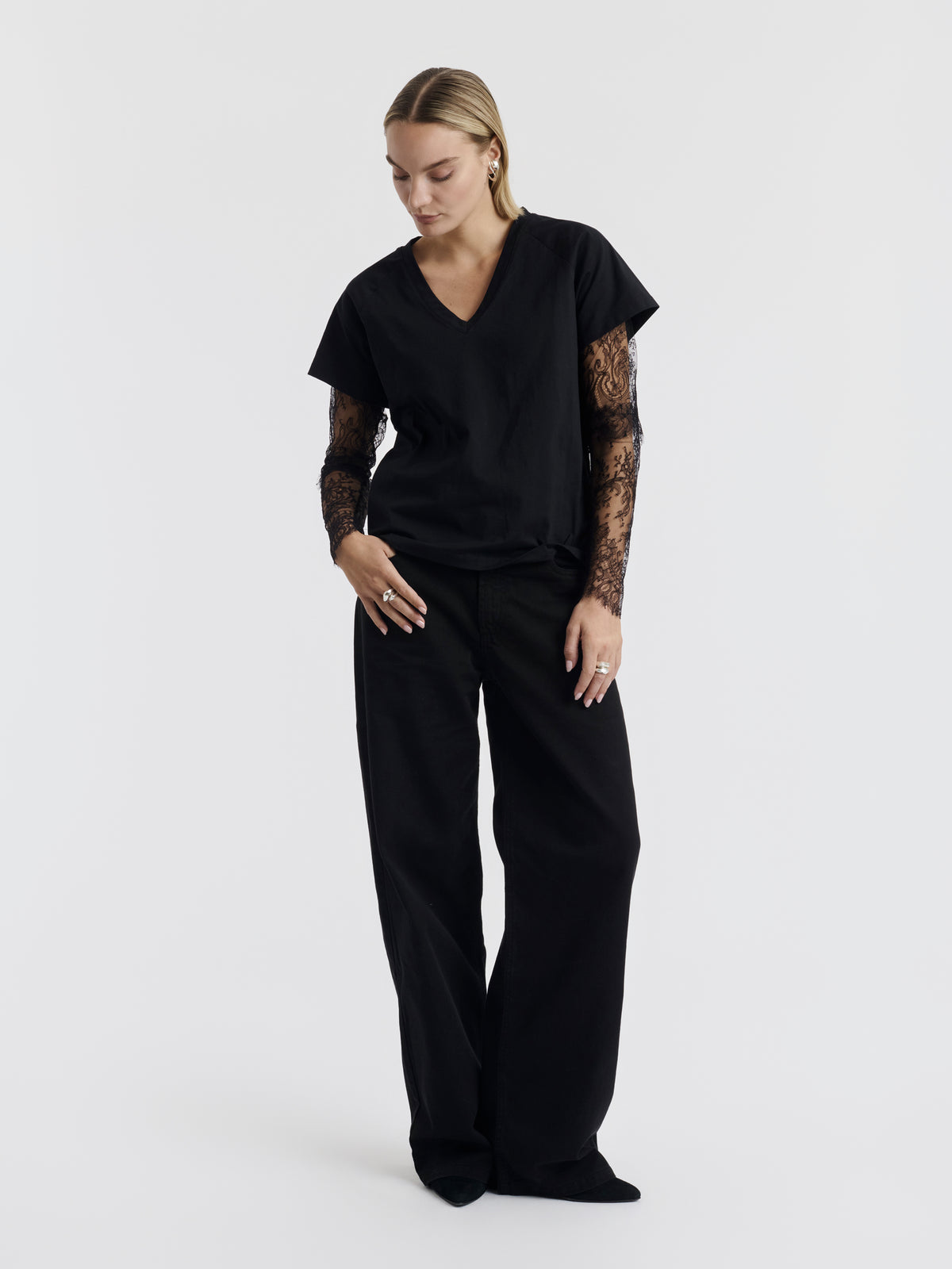 Black COURTNEY T-shirt with lace sleeves worn, front view