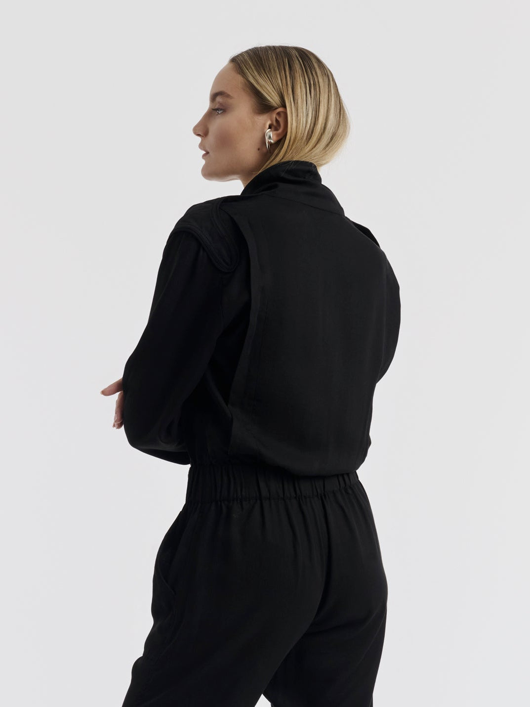 Black JIM racing jumpsuit worn, front view