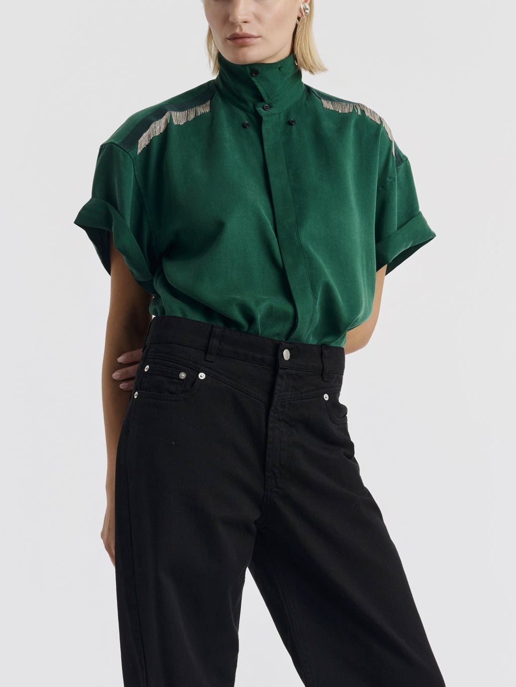 Black JENNI high-waisted jeans worn with the green MARCUS shirt