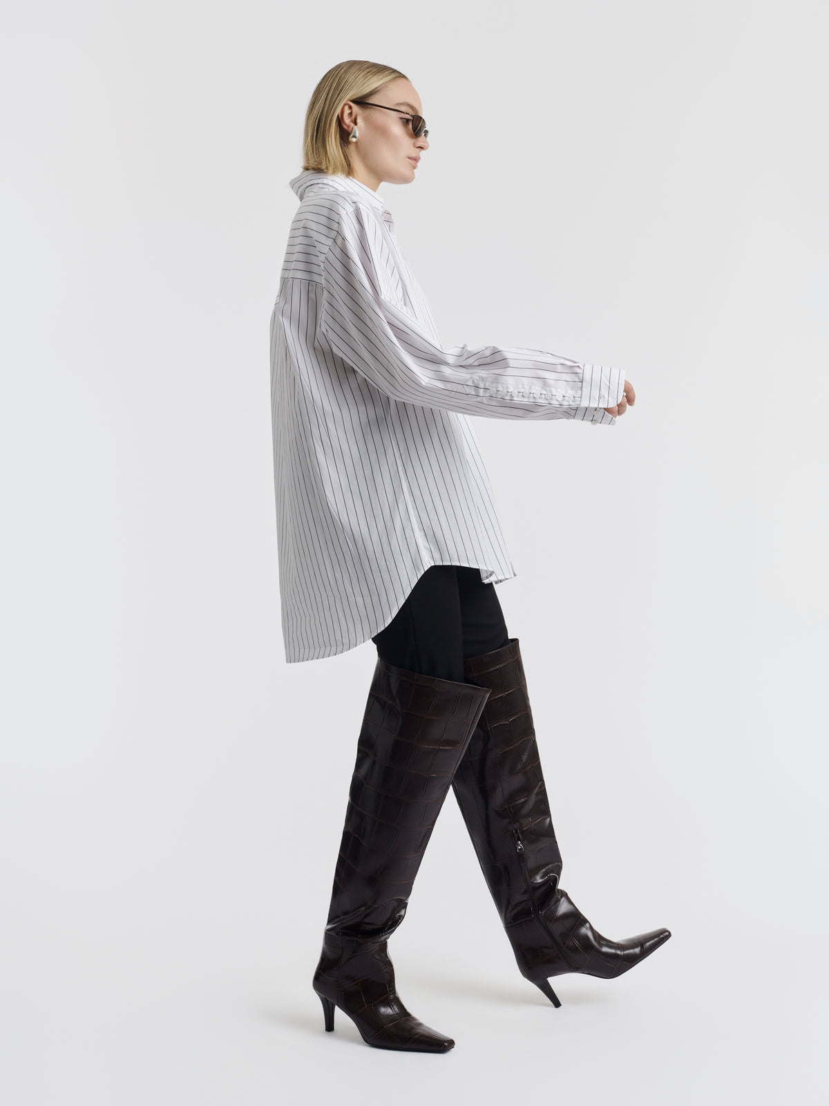 Black striped MEL oversized shirt worn, front view