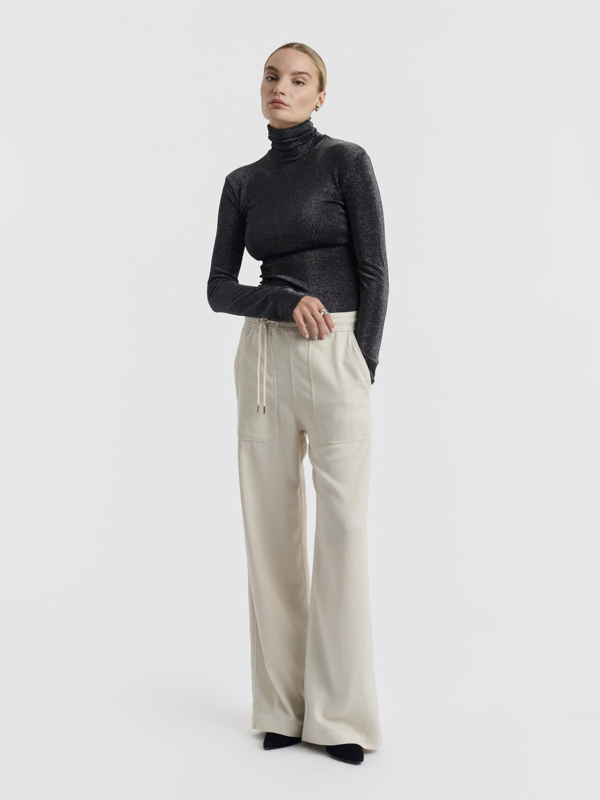 Seashell VIC LYOCELL wide-leg trousers worn with the ELISABETH lurex top