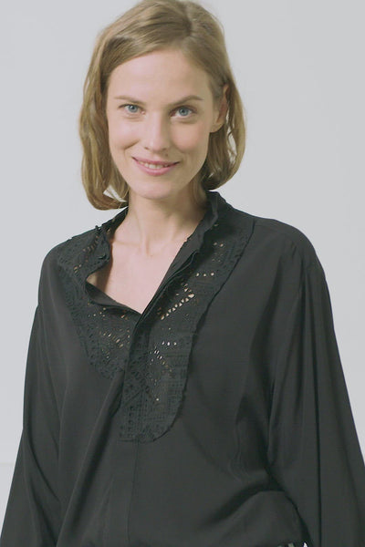 Fluid women's black smoking shirt with broderie anglaise, application smoking cuffs with self covered buttons Black viscose with black cotton broderie anglaise. Made in Portugal