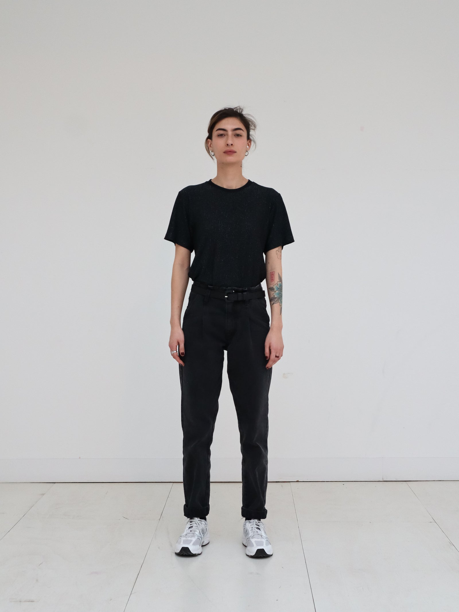 Deluxe jersey T-shirt with thin lamé silver stripes.  Straight & relaxed fit and crew neck line. 100% grey viscose jersey with vertical silver lamé stripes. Made in Portugal
