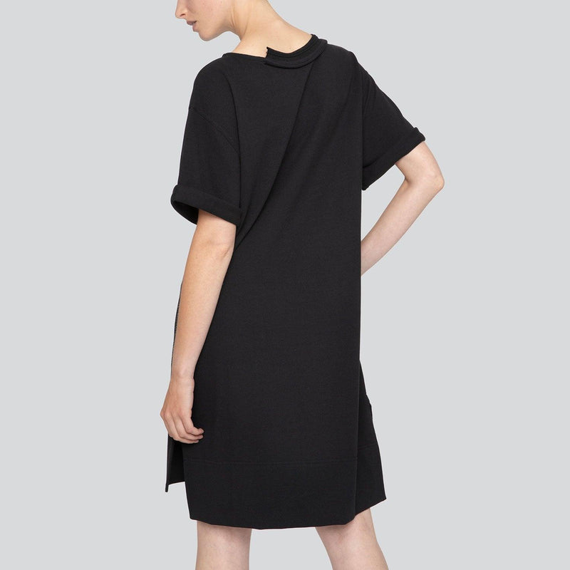SARAH DE SAINT HUBERT oversized black T-shirt dress made of cotton piqué jersey with short rolled-up sleeves. Comfy and straight fit.