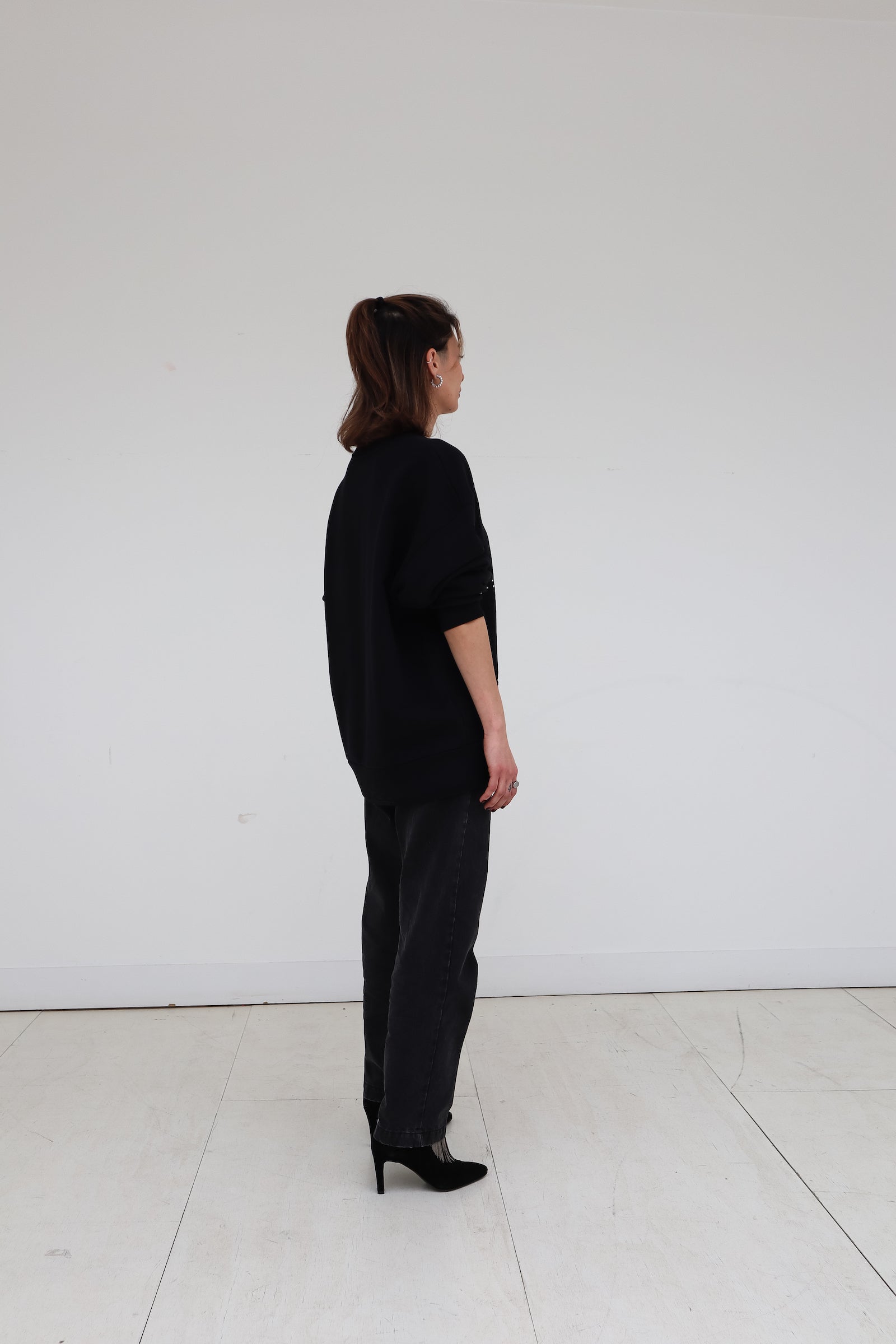 Signature Sweatshirt featuring our iconic 'broderie anglaise' at the front. Hand-Embroidered in BELGIUM with small pearls at the front (perles de cultures, 'grains de riz'). Relaxed fit, dropped shoulders. 100% black cotton. Made in Portugal, embroidered in Belgium other sizes available on demand